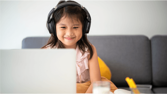 A girl is using a laptop