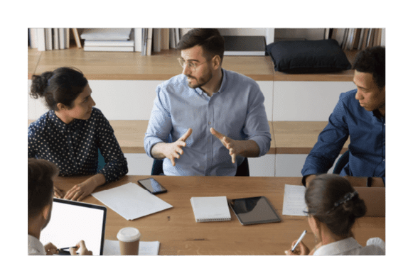 a group of teacher discussing the strategies to improve their students' achievements